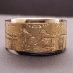 Precious metal yellow gold duck band with dog ring