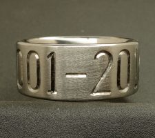 Custom titanium ring with wedding date engraved