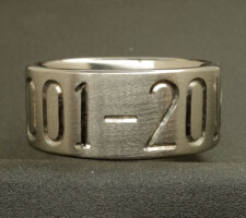 Custom titanium ring with wedding date engraved