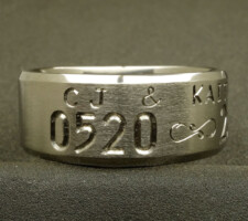 Titanium wedding ring 2 line beveled edge with a fishhook infinity dash