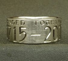 This 2 line 10mm titanium elk ring was designed around an image of the elk that hangs out in the clients front yard