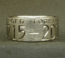 This 2 line 10mm titanium elk ring was designed around an image of the elk that hangs out in the clients front yard