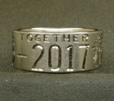 This 2 line 10mm titanium elk ring was designed around an image of the elk that hangs out in the clients front yard