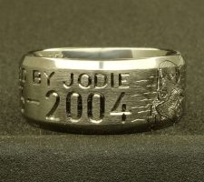 Beveled edge 2 line titanium ring with clients 2 bird dogs a locked up duck and an airboat in the proper setting