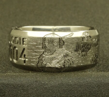Beveled edge 2 line titanium ring with clients 2 bird dogs a locked up duck and an airboat in the proper setting