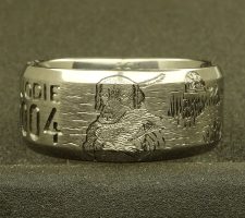 Beveled edge 2 line titanium ring with clients 2 bird dogs a locked up duck and an airboat in the proper setting