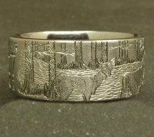 Duck band and a deer ring with cypress trees