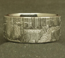 Duck band and a deer ring with cypress trees