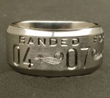 Beveled edge 2 line duck band with double mallard feather dash and a wood duck bust on the back side