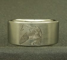 Buck a duck and a red fish wedding ring