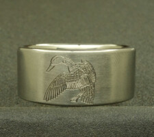 Buck a duck and a red fish wedding ring