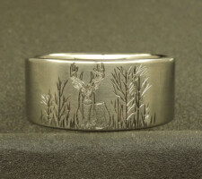 Buck a duck and a red fish wedding ring