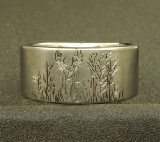 Buck a duck and a red fish wedding ring