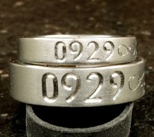 Single line date only with fishhook infinity dash and crossed rifle and fishing pole matching pair wedding rings