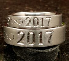 Single line date only with fishhook infinity dash and crossed rifle and fishing pole matching pair wedding rings