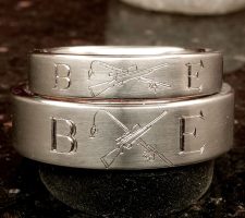Single line date only with fishhook infinity dash and crossed rifle and fishing pole matching pair wedding rings