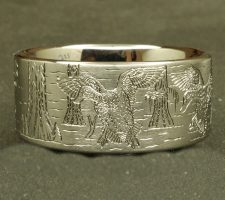 Locked up pair of mallards in cypress trees on a 3 line titanium duck band