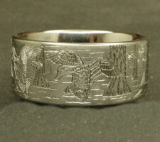 Locked up pair of mallards in cypress trees on a 3 line titanium duck band