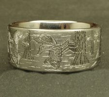 Locked up pair of mallards in cypress trees on a 3 line titanium duck band