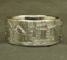 Locked up pair of mallards in cypress trees on a 3 line titanium duck band