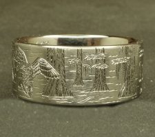 Locked up pair of mallards in cypress trees on a 3 line titanium duck band