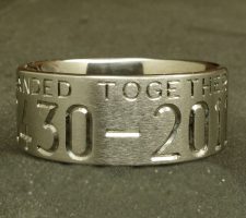 Two line titanium duck ring with committed pair of mallards and cattails. With a crossed shotgun and fishing pole with family initials