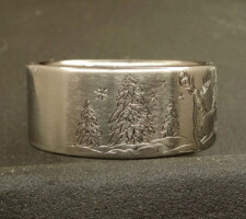 Titanium Deer ring with the buck and doe in a winter setting