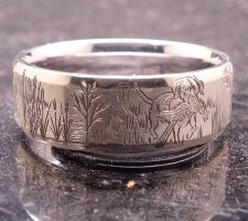 Precious metal white gold duck band with dog ring