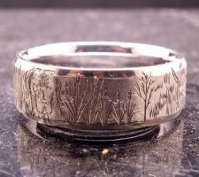 Precious metal white gold duck band with dog ring