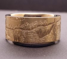 Precious metal yellow gold duck band with dog ring