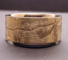 Precious metal yellow gold duck band with dog ring