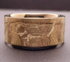 Precious metal yellow gold duck band with dog ring