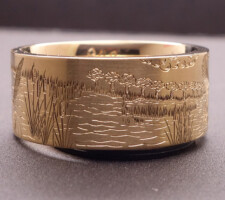 Precious metal yellow gold duck band with dog ring